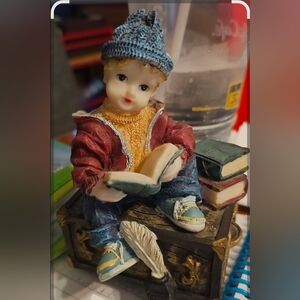 Boy Figurine with Books